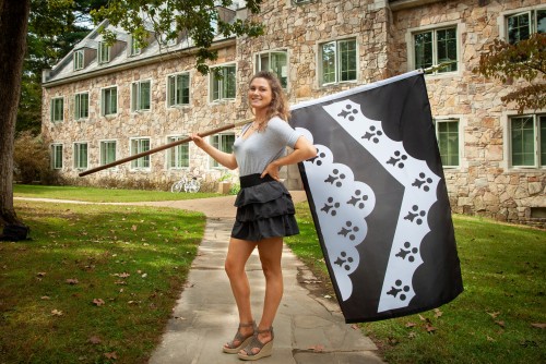 Student holding a flag 3