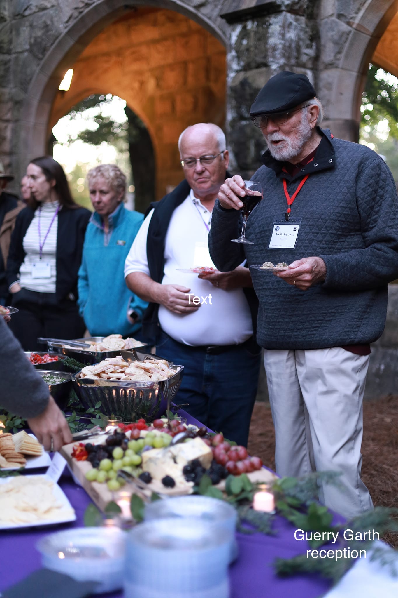 photograph of ray gotko and fellow bell ringers at the reception outside guerry garth