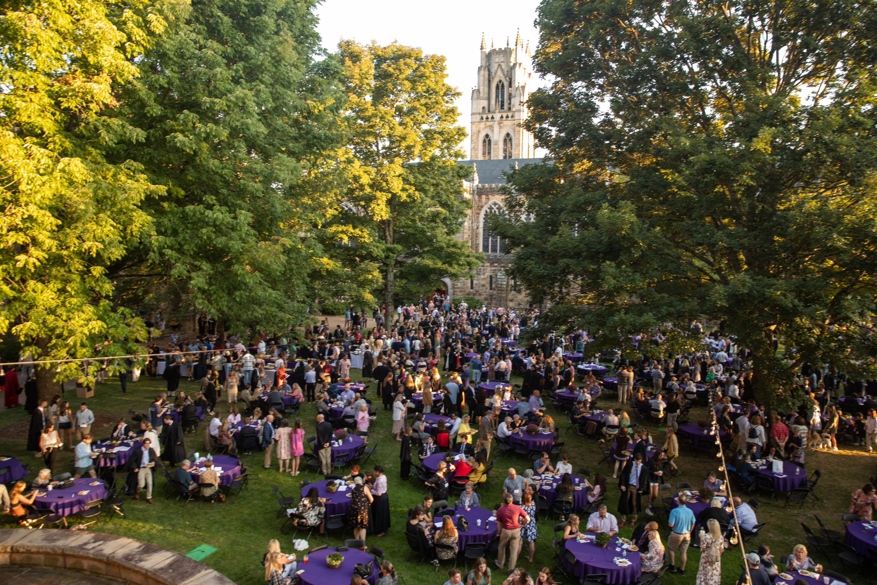 A large courtyard with crowded picnic