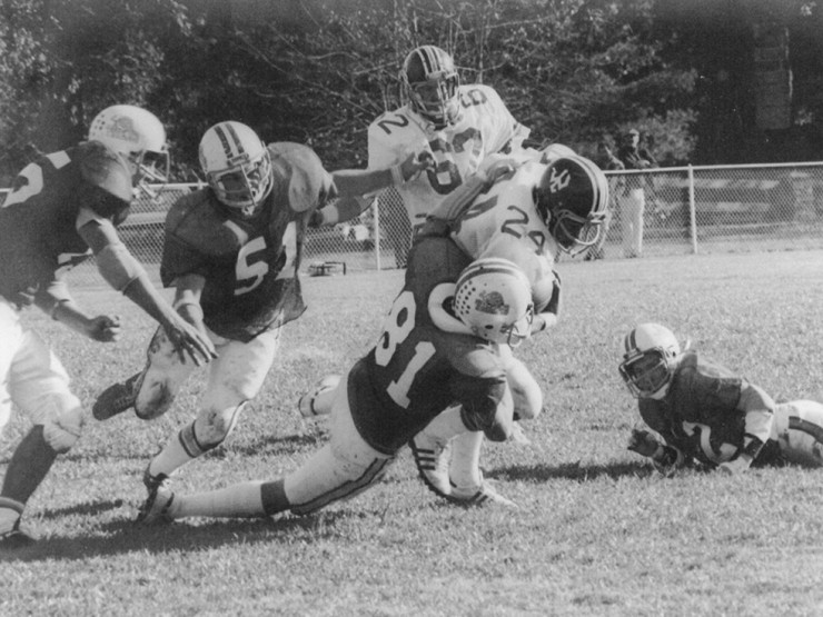 An action shot from a 1981 Sewanee game against Washington and Lee. Pictured from left to right: linebacker Weston Andress, C&rsquo;82; defensive tackle Moose Phillips, C&rsquo;83; right defensive end Mark Cotter, C&rsquo;84; and cornerback Hunter Keller, C&rsquo;82.