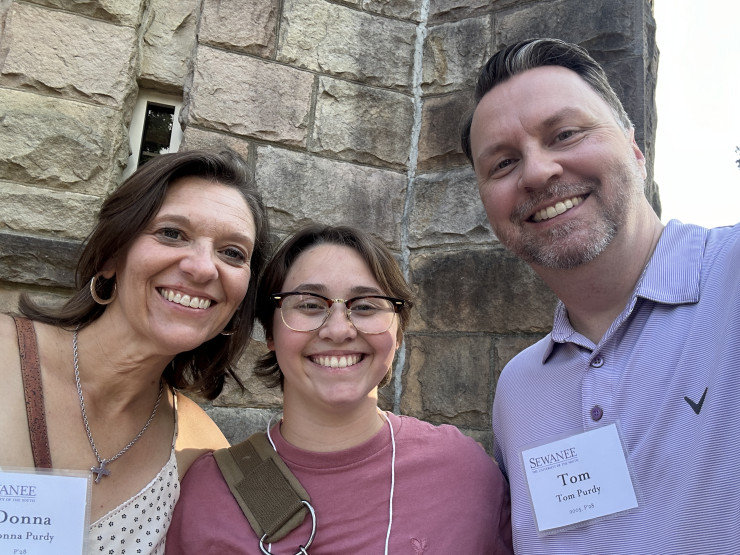 The Purdys with Eva during a recent visit to the Mountain