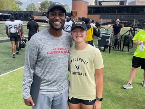 Knight visiting with Jenna Black, C'25, daughter of former Sewanee football coach Robert Black, C'89, P'22, P'25, at Vanderbilt in 2024
