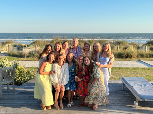 Renner with fellow TKP Class of 2015 pledges at a reunion on Kiawah Island in 2023. Back row (left to right): Rebecca Sanders, Ellie Murphy, Mary West Snover, Anna Lane, Lillie Belle Viebranz Renner, Sumner Green McIntyre, Sara Best Foote. Front row (left to right): Elise Harrigan Keenan, Cate Hargrove Taylor, Sydney Gemes Suspenski, Perry Garrett Reilly, Aloïse Phelps. "Fun fact," Lillie Belle says, "four of us are married to other Sewanee alumni!"