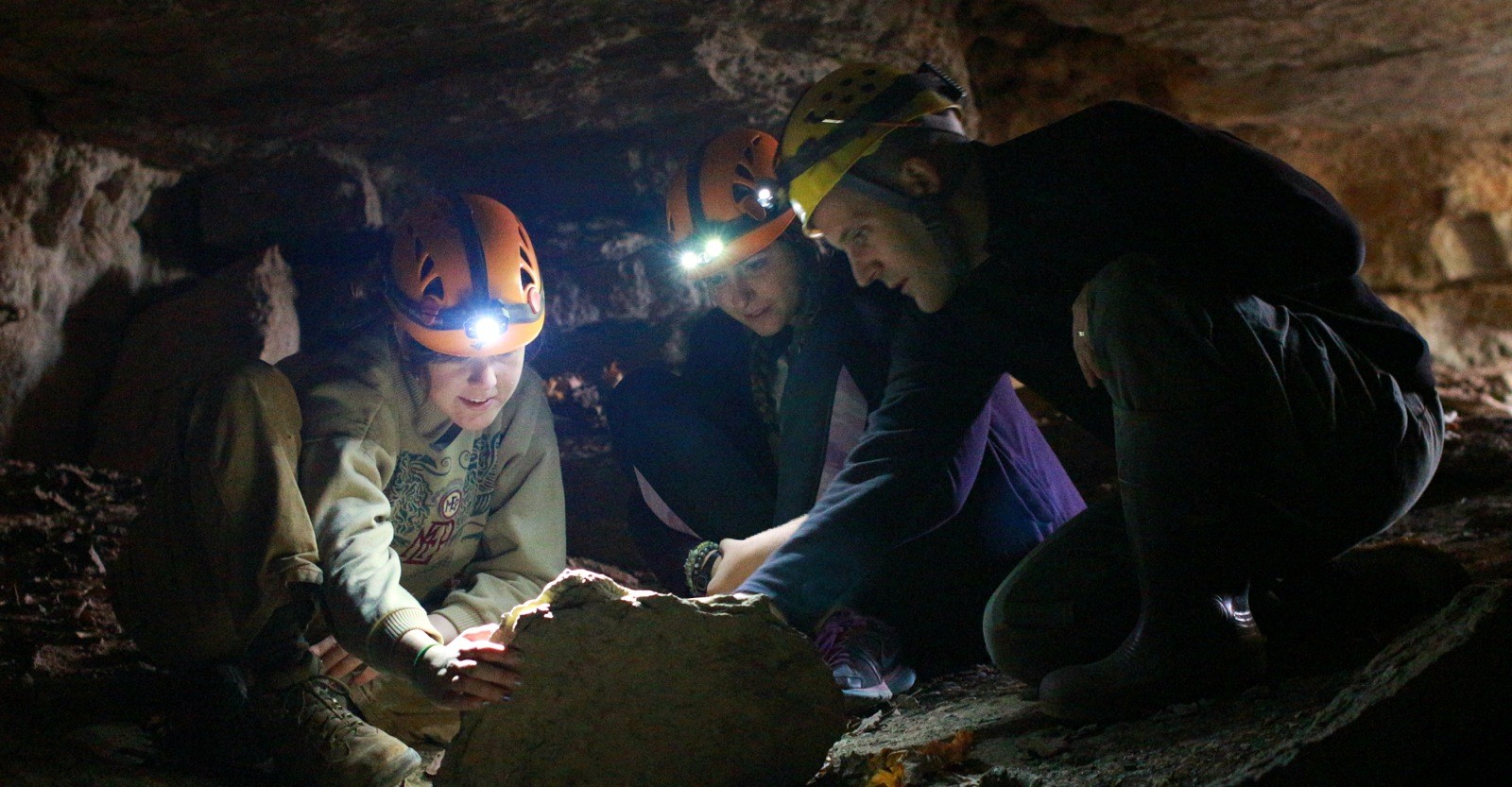 MaryBeth Yancey, C’17, (left) and Bre Ayala, C’17, (center) are two of more than a dozen students who have worked on biological surveys in area caves with Biology Professor Kirk Zigler. Photo by Stephen Priest, C’20