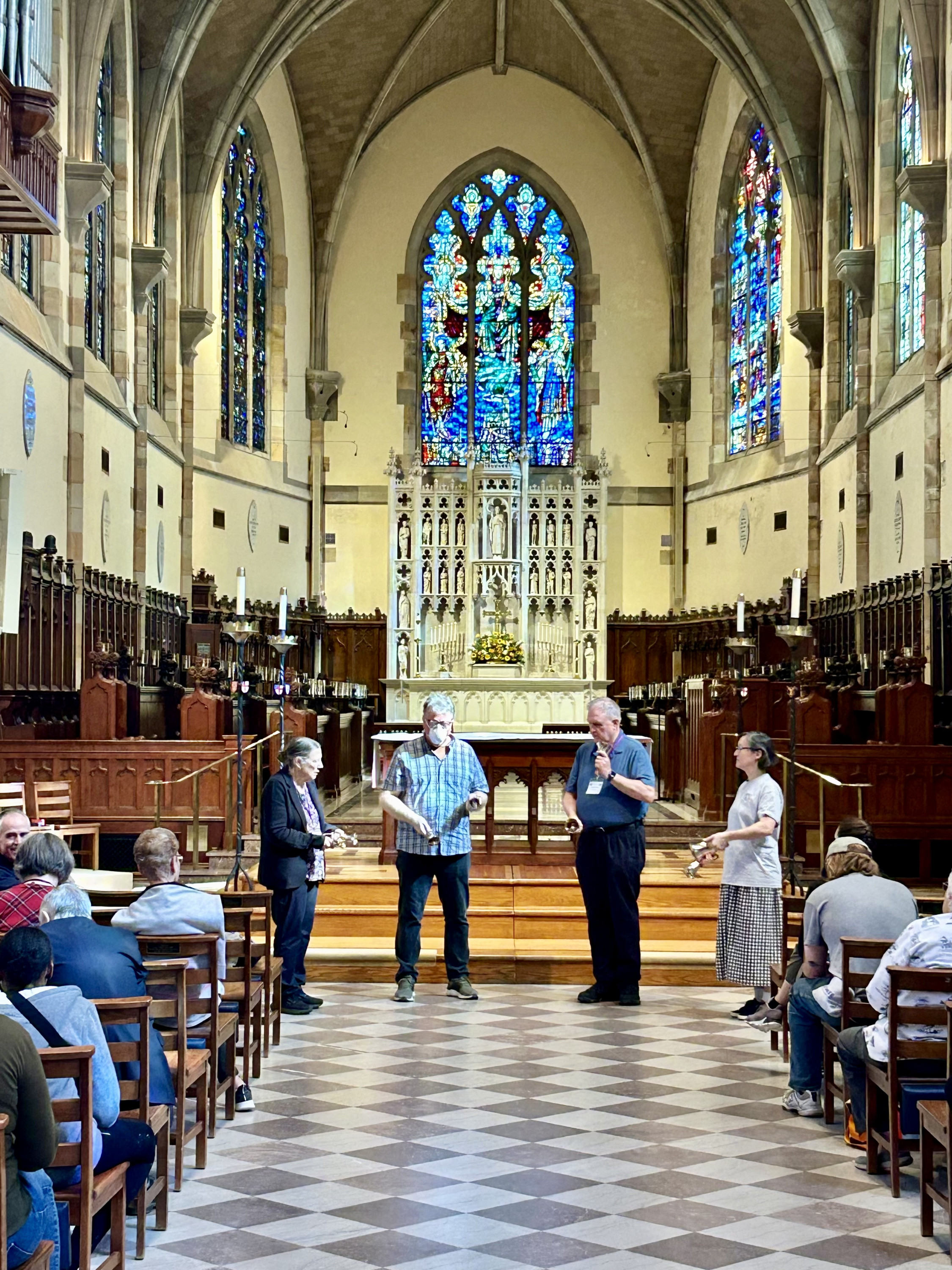 photograph of handbell ringers at all saint's chapel in sewanee