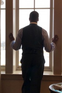 Leelie Selassie captured this photo of Reuben Brigety pausing for a moment of reflection in their room at the Sewanee Inn on the morning of his election.