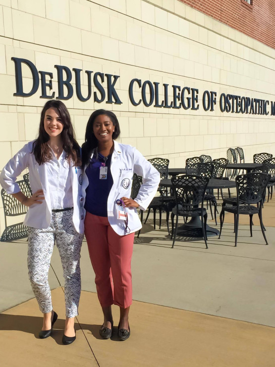 Katherine Mustafa, C'14 and Cortney Booth, C'12