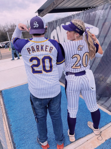 Jon and Madilyn in matching jerseys