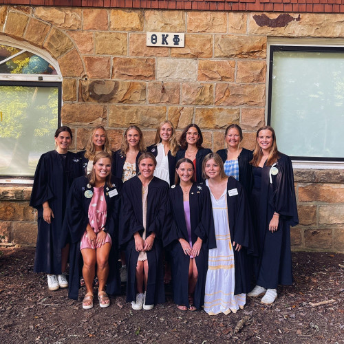 Anne Mitchell with TKP sorority sisters from the Class of 2022 at the Wheat House (formerly the TKP House). Bottom left to right: Hadley Meadows, Gray Cox, Anne Mitchell Welch, Buckley Norman. Top left to right: Caroline Sugar, Molly Wheeler, Katharine Linnartz, Katherine Montgomery, Isabel Root, Stella Pritchard, Annmarie Youtt.